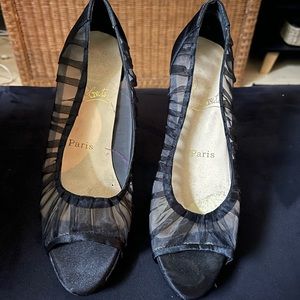 Black lace Christian Louboutins